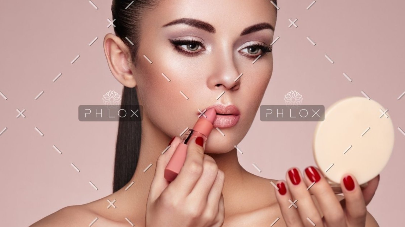 demo-attachment-1165-beautiful-woman-paints-lips-with-lipstick-PMB6YWP-1